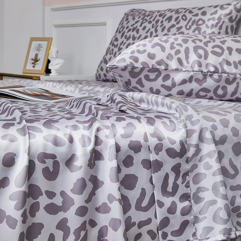 Couvre lit motifs léopard satiné 4 pièces