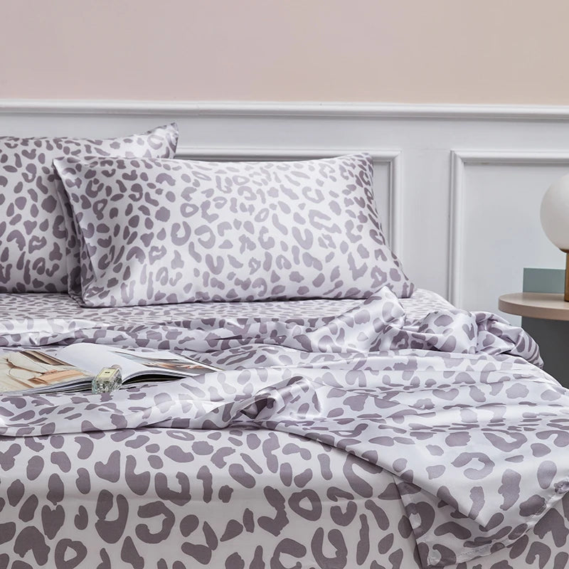 Couvre lit motifs léopard satiné 4 pièces