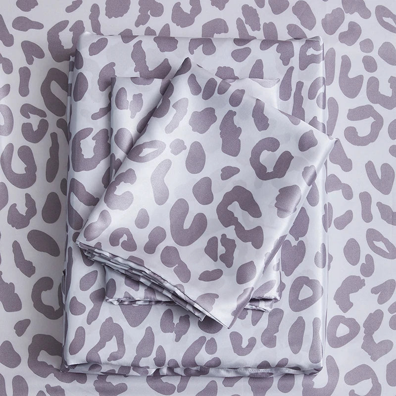 Couvre lit motifs léopard satiné 4 pièces