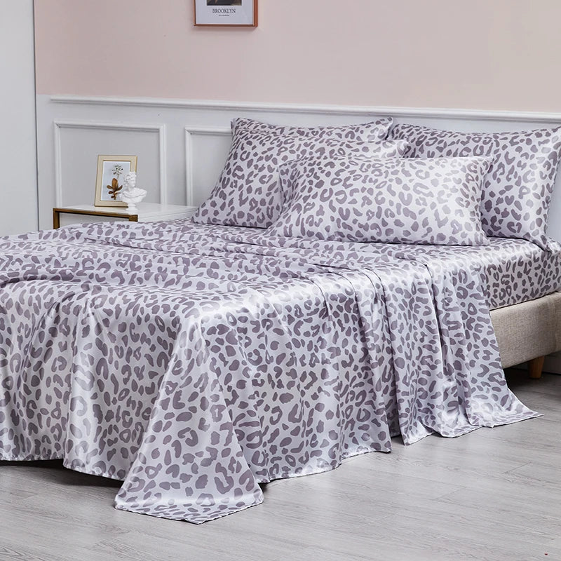Couvre lit motifs léopard satiné 4 pièces